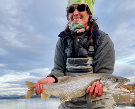 Madelynn Holding a Lake Trout.
